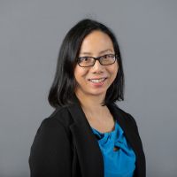 A professional headshot of Joanne Wan