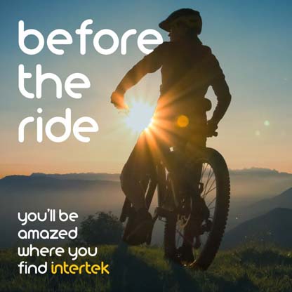 A rider on a mountain bike with the sun behind him